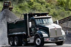 Blooming Glen Contractors: A BGC Kenworth T880 dump truck picks up aggregate at Naceville Quarry.